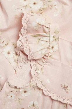 Blomsterjumpsuit med sommerfugler