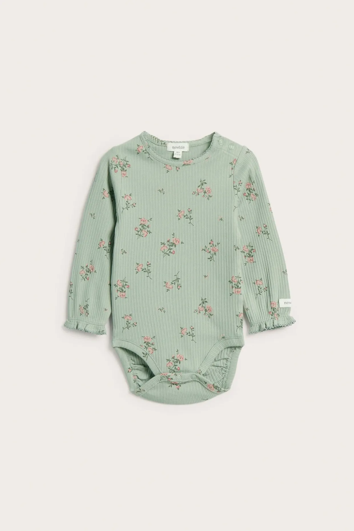Blomstermønstret ribbestrikket body