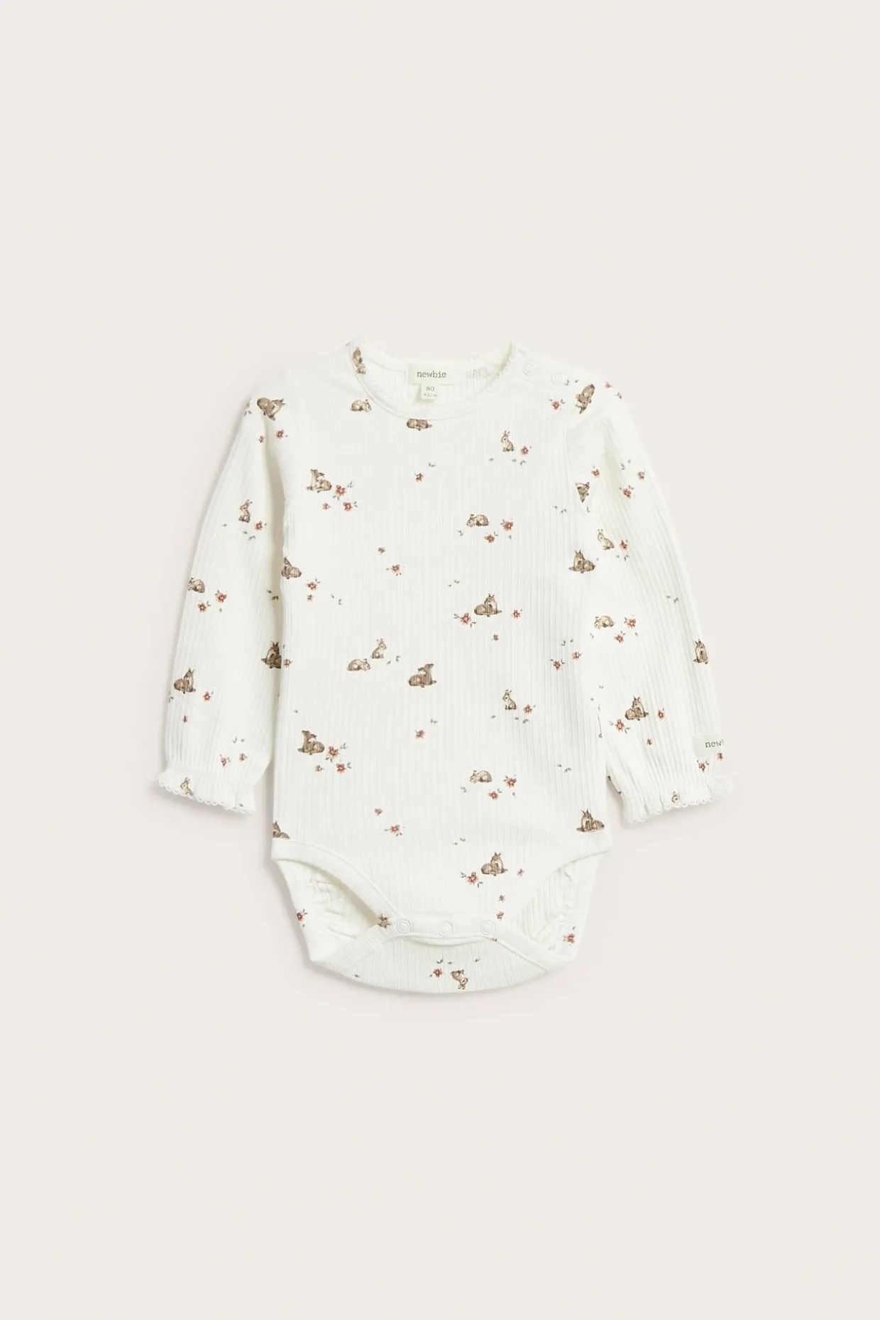 Blomstermønstret ribbestrikket body