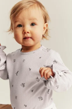 Blomstrete body i ribbetrikot