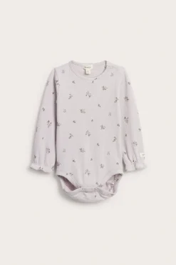 Blomstrete body i ribbetrikot