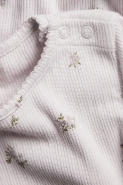 Blomstrete body i ribbetrikot