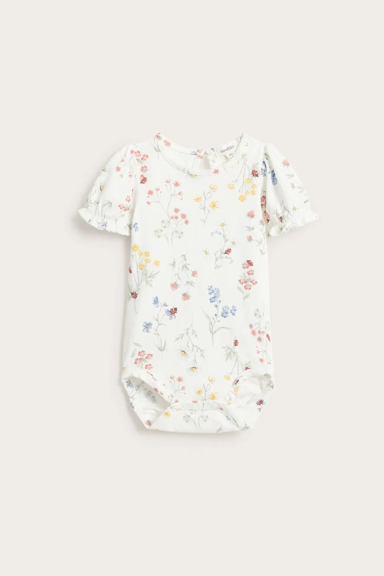 Blomstrete body med puffermer