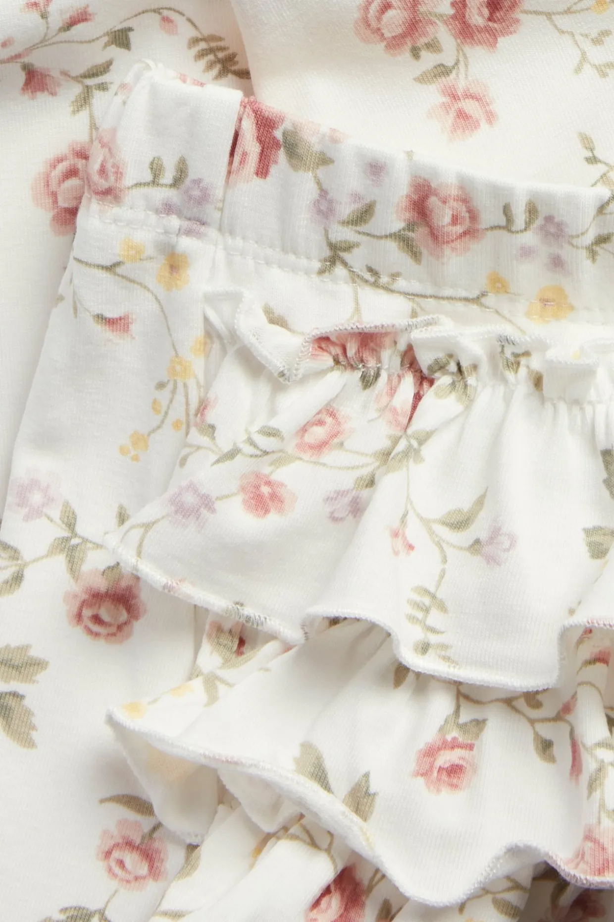 Blomstrete leggings med volanger