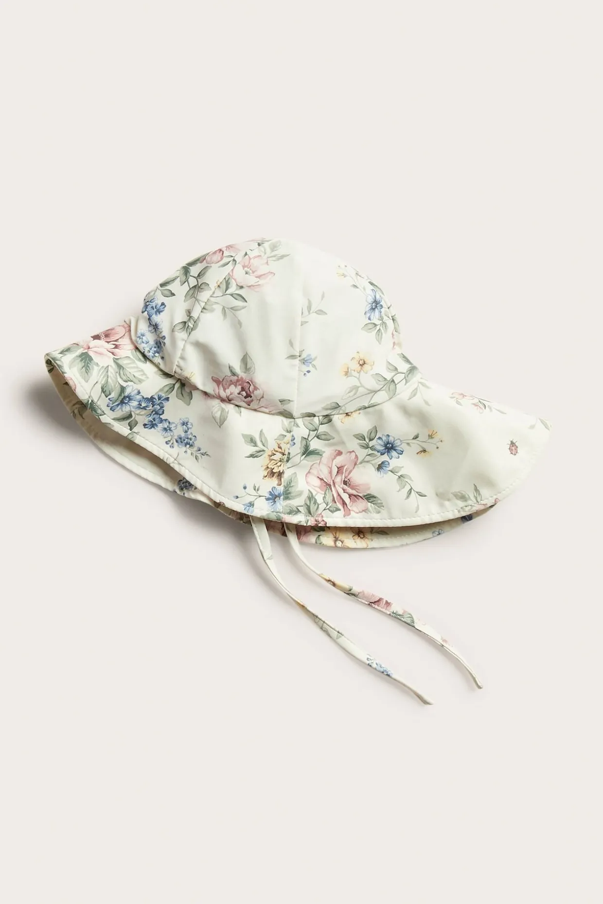 Blomstret solhatt med UV-beskyttelse