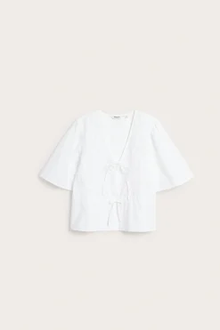 Bluse i bomullspoplin med broderi og knytebånd
