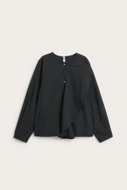 Bluse med avtakbar volang