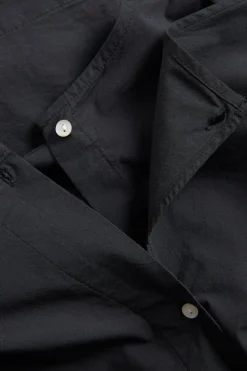 Bluse med avtakbar volang
