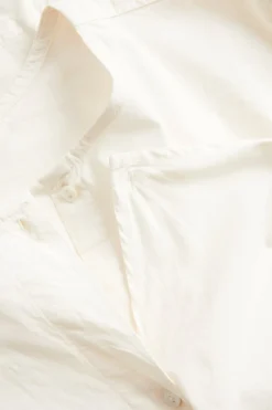 Bluse med avtakbar volang