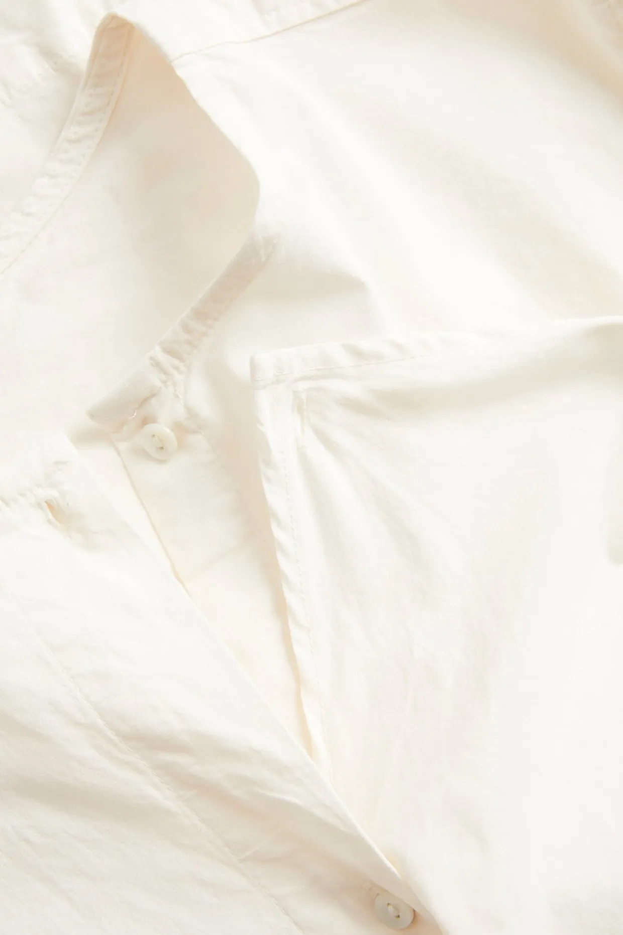 Bluse med avtakbar volang