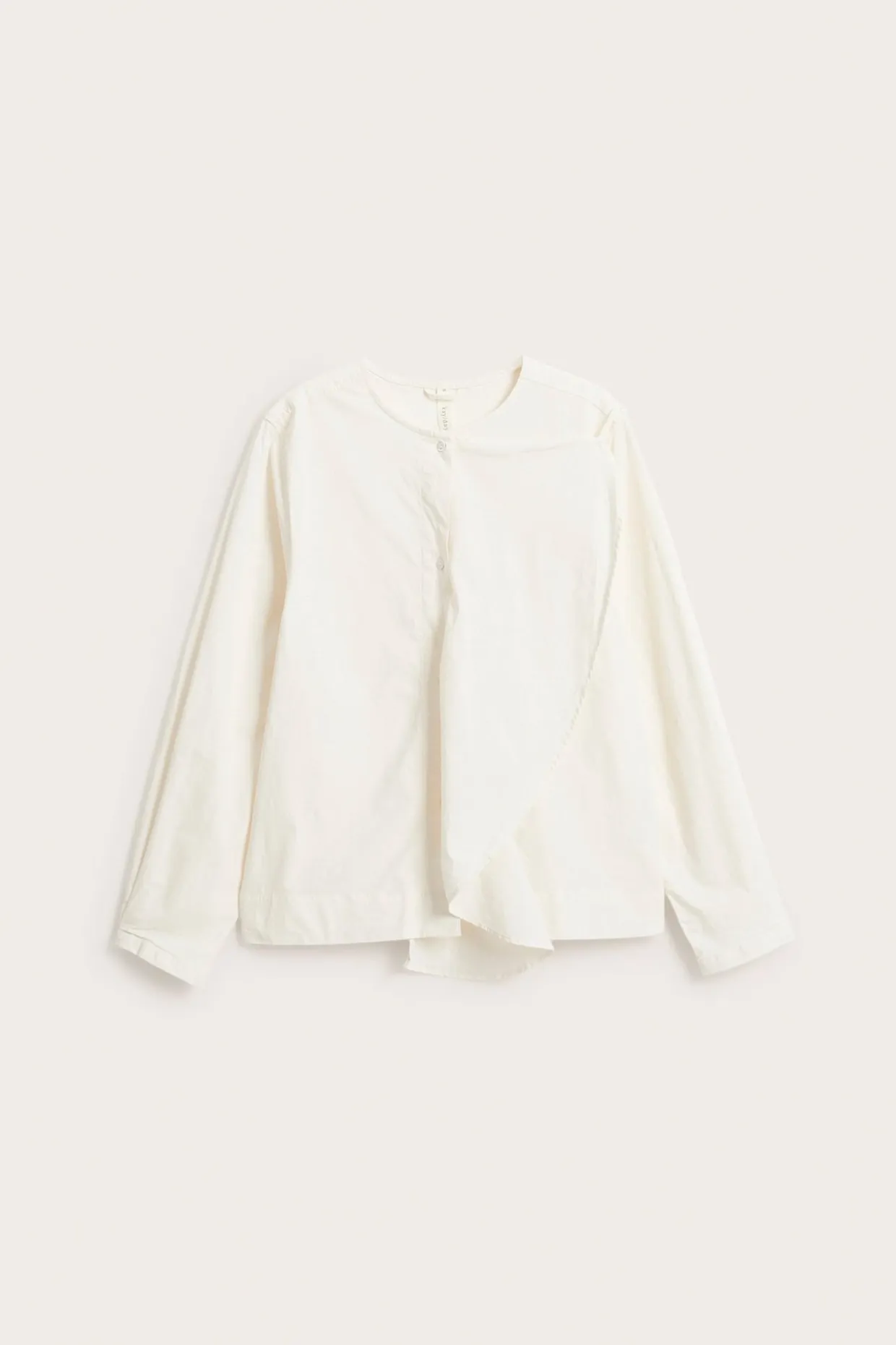 Bluse med avtakbar volang