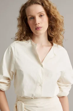 Bluse med avtakbar volang