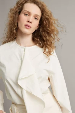 Bluse med avtakbar volang