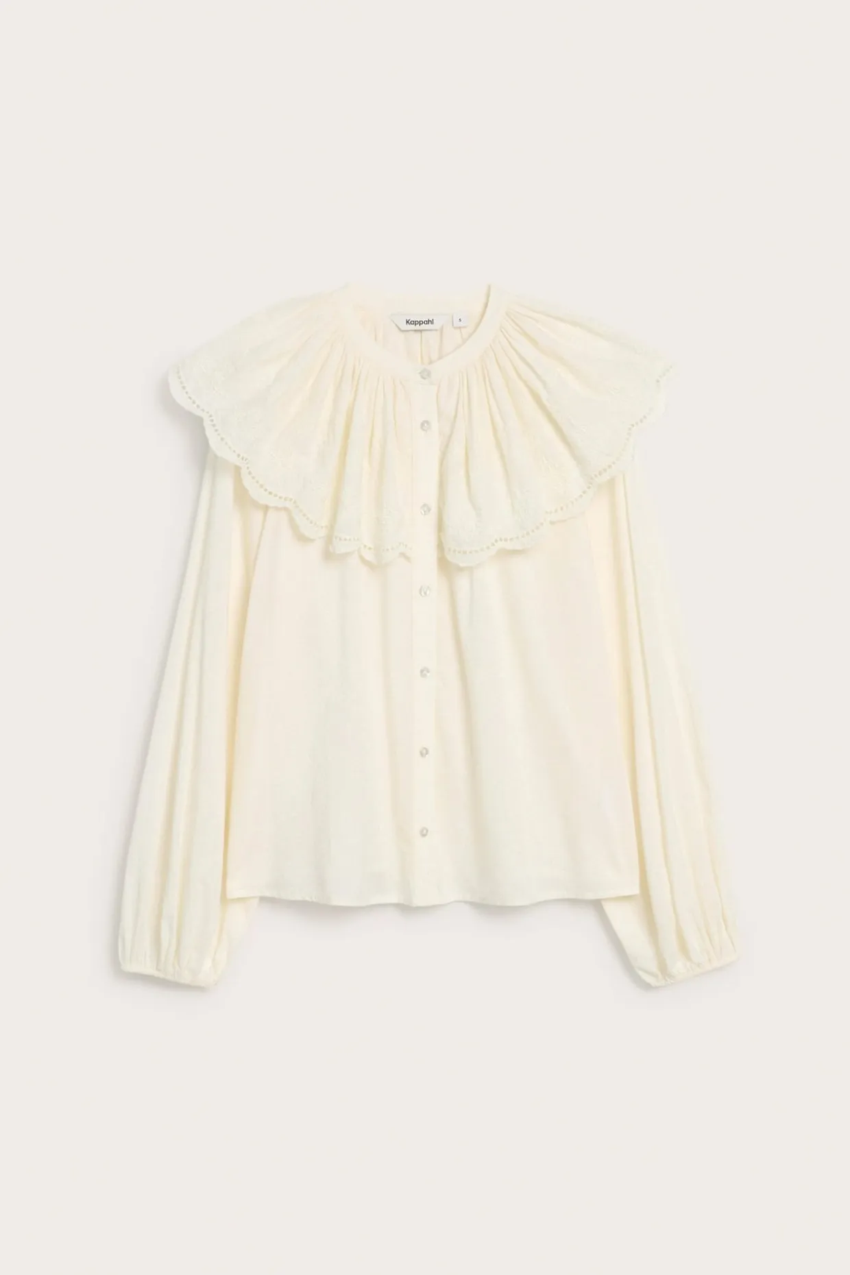 Bluse med brodert kappe