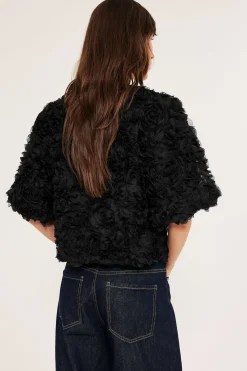 Bluse med puffermer og knyting