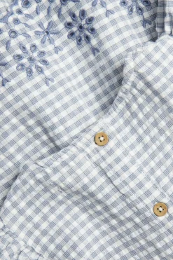 Body med volanger og broderi