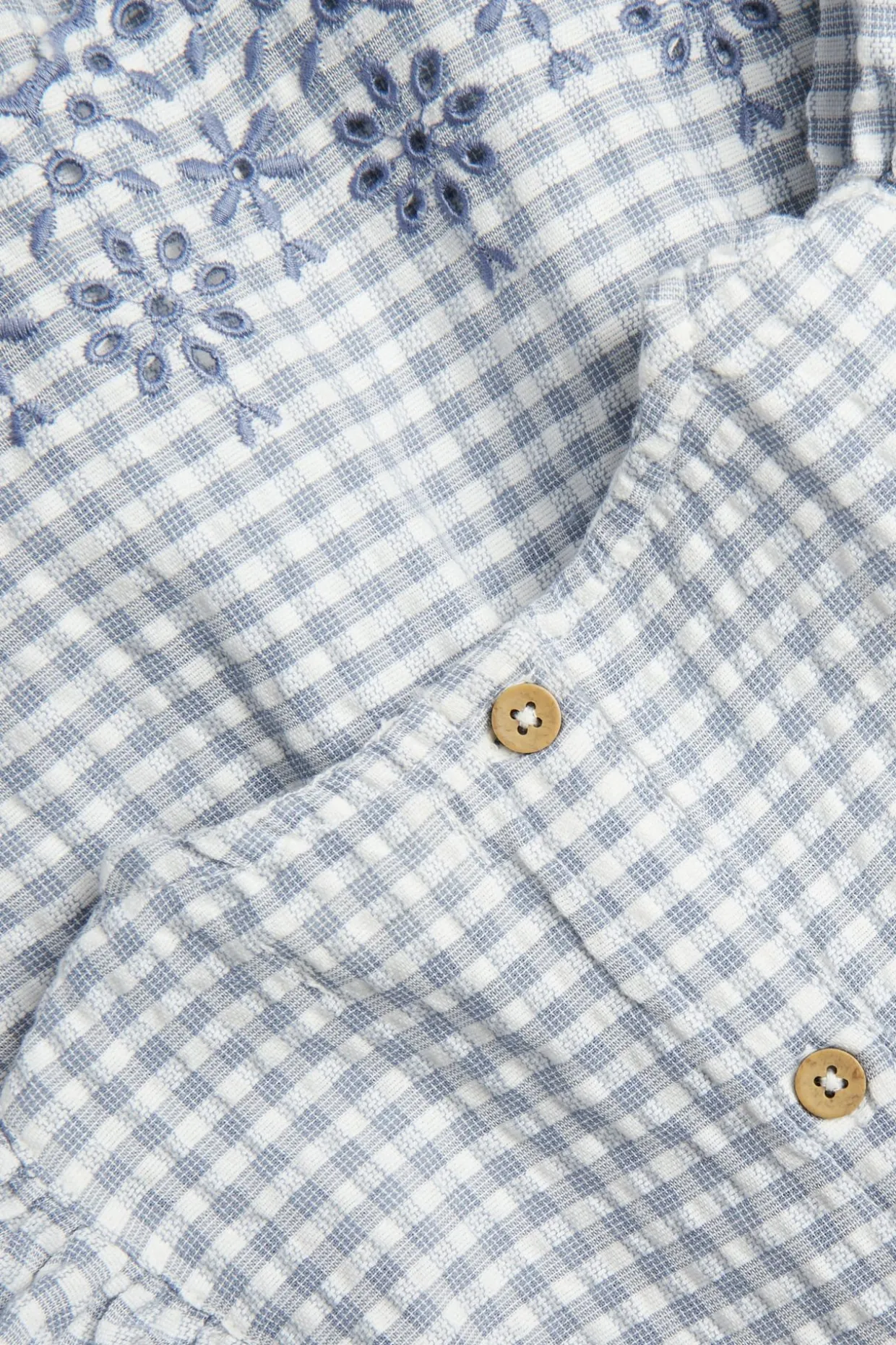 Body med volanger og broderi
