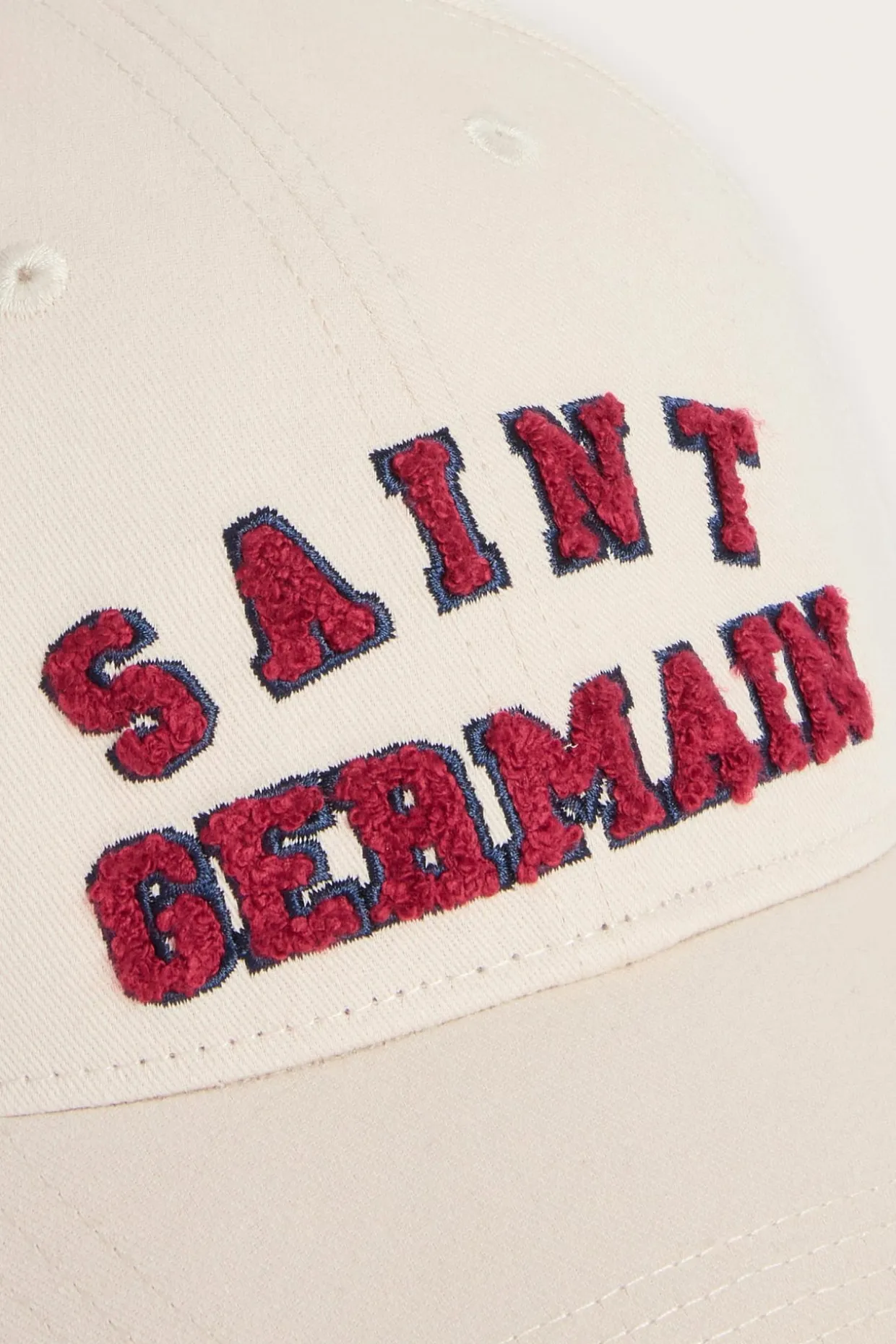 Caps med brodert tekst
