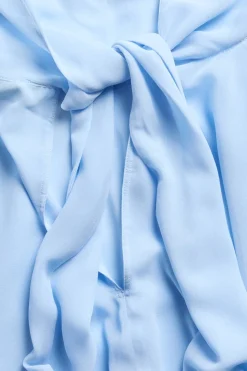 Chiffonbluse med kappesilhuett