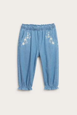 Denimbukse med blomsterbroderier