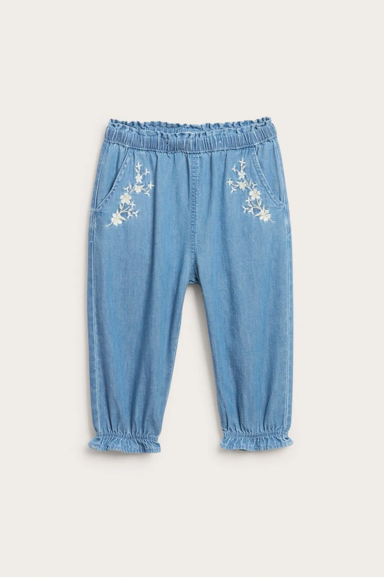 Denimbukse med blomsterbroderier