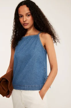 Ermeløs denimtopp med knytebånd i siden