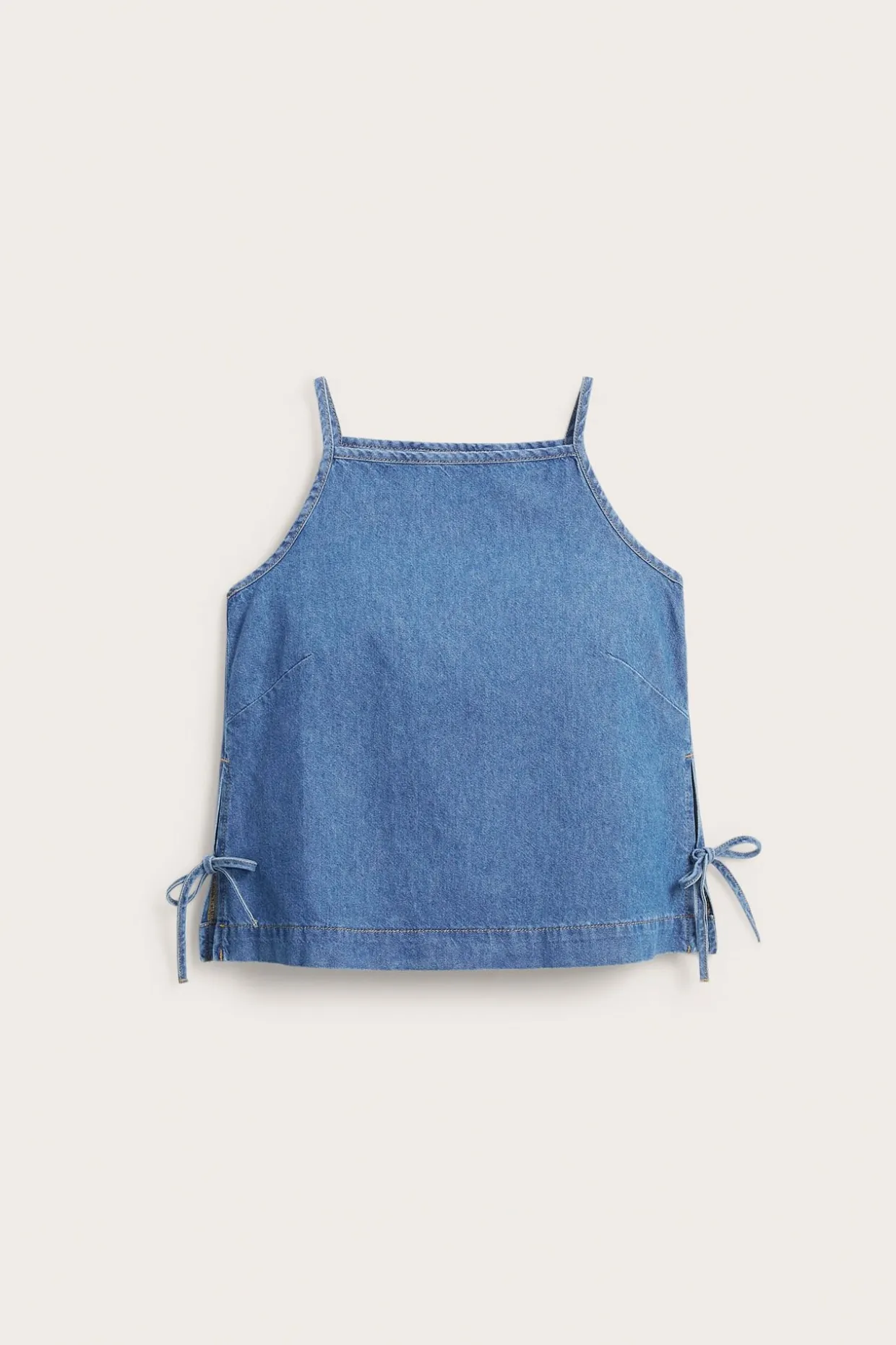 Ermeløs denimtopp med knytebånd i siden