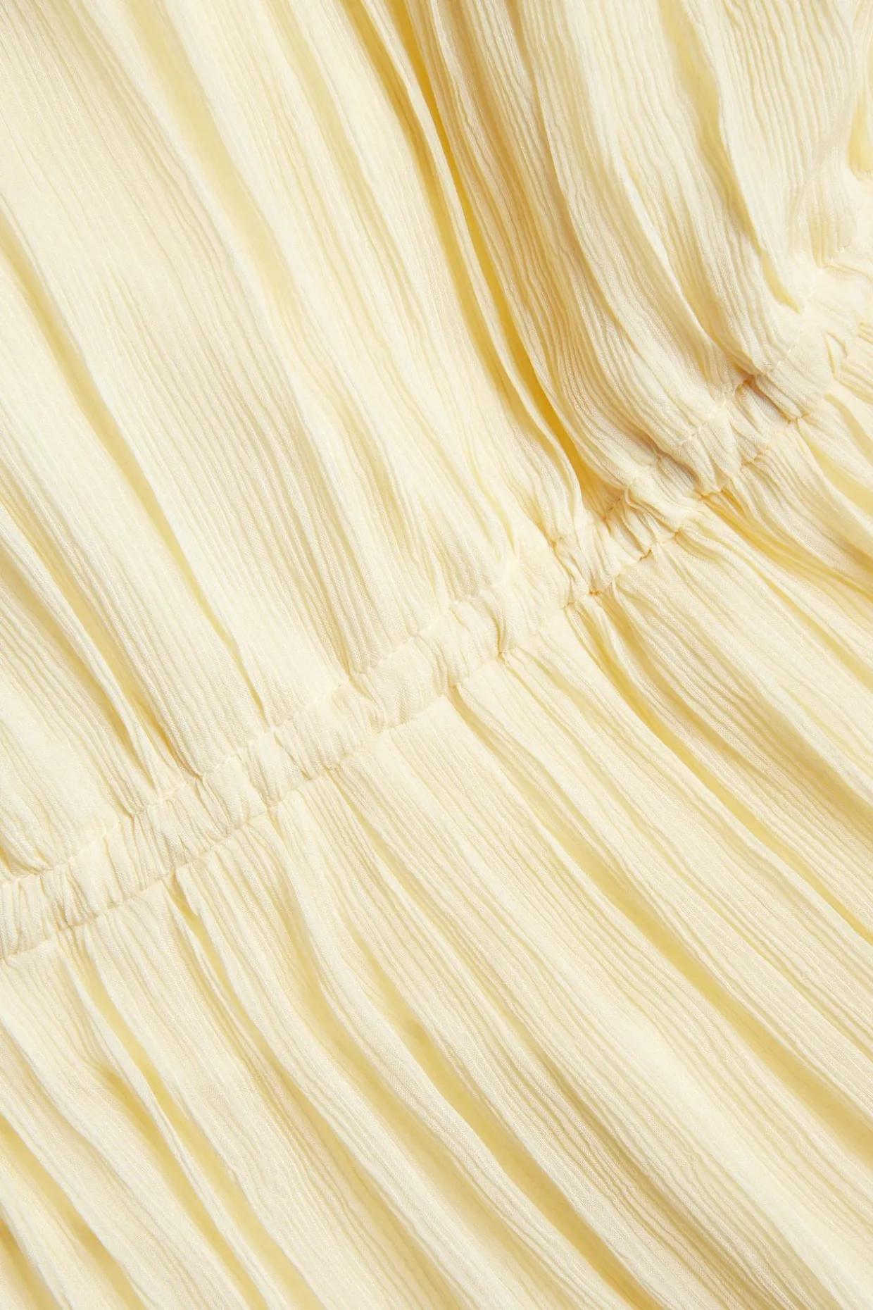 Ermeløs kjole i chiffon