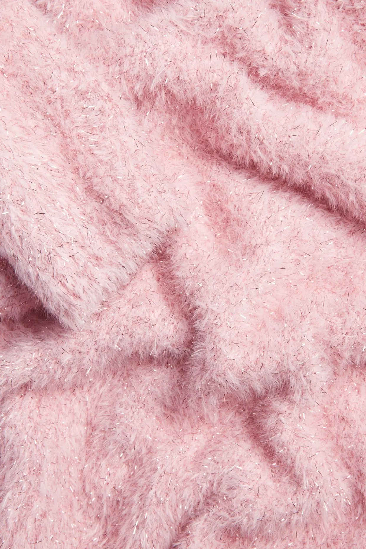 Glitrende strikkegenser