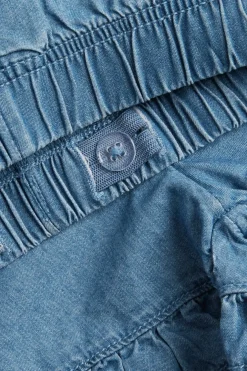 Jeansshorts med volangkant