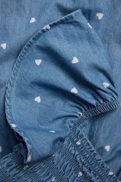 Jumpsuit med hjertemønster og volangermer