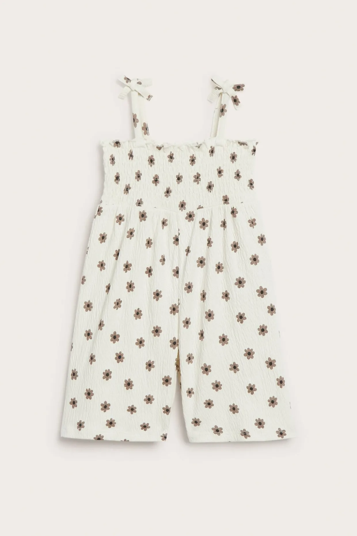 Jumpsuit med små blomster og sløyfer