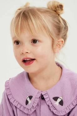 Kortermet bluse med broderi