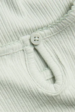 Kortermet body med puffermer