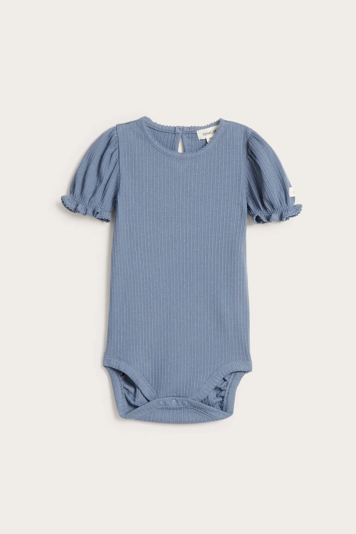 Kortermet body med puffermer