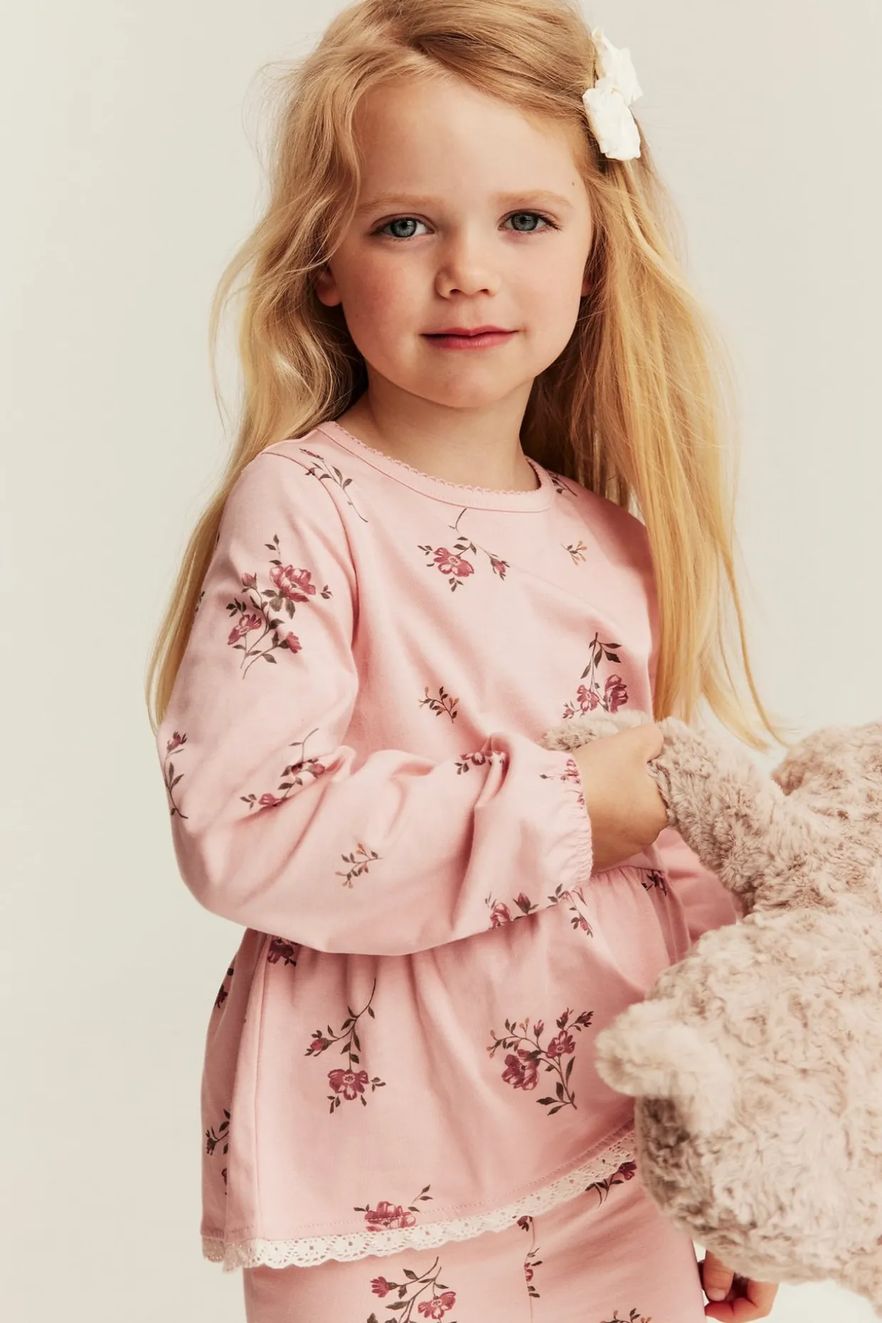 Langermet blomstret peplum-topp