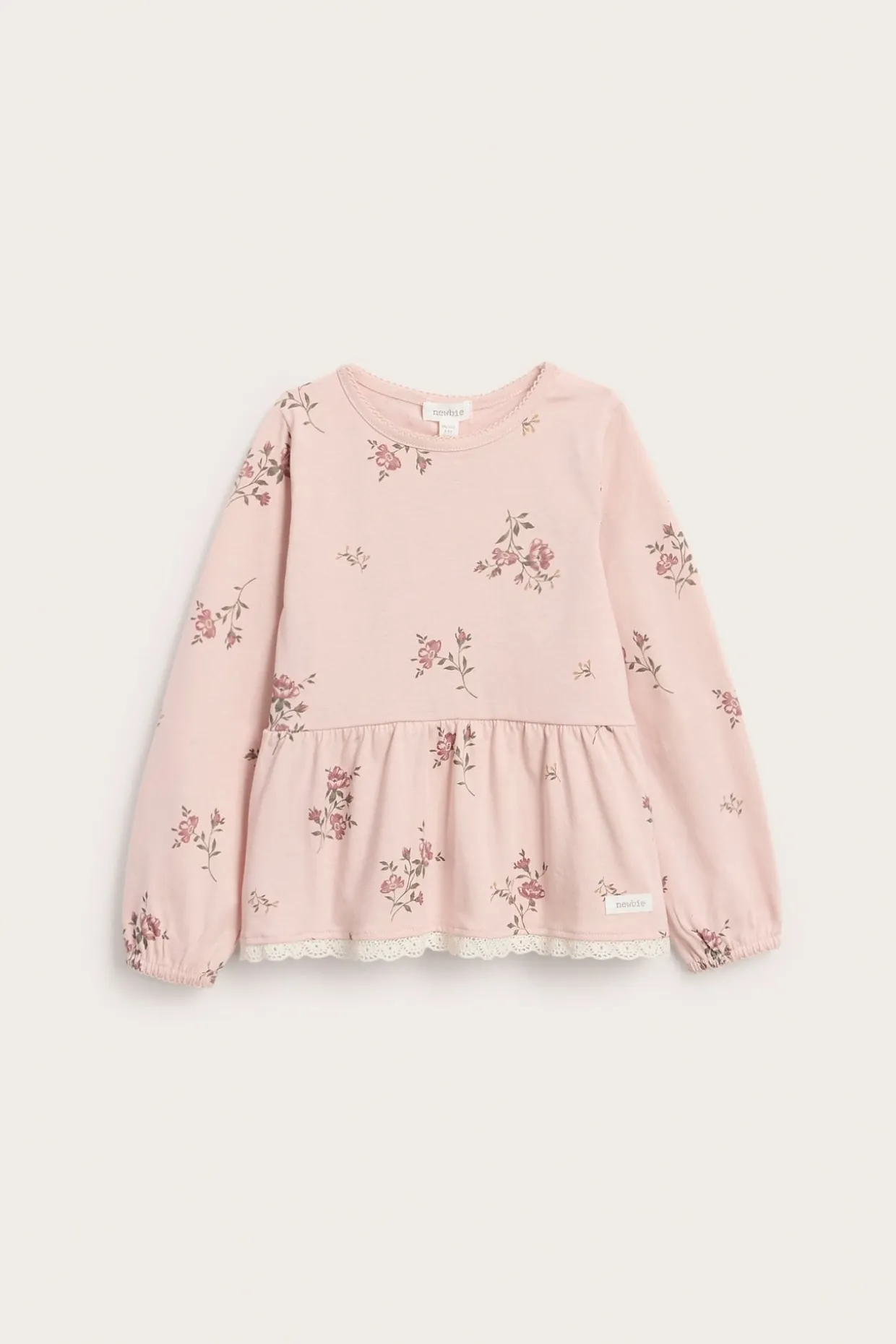 Langermet blomstret peplum-topp