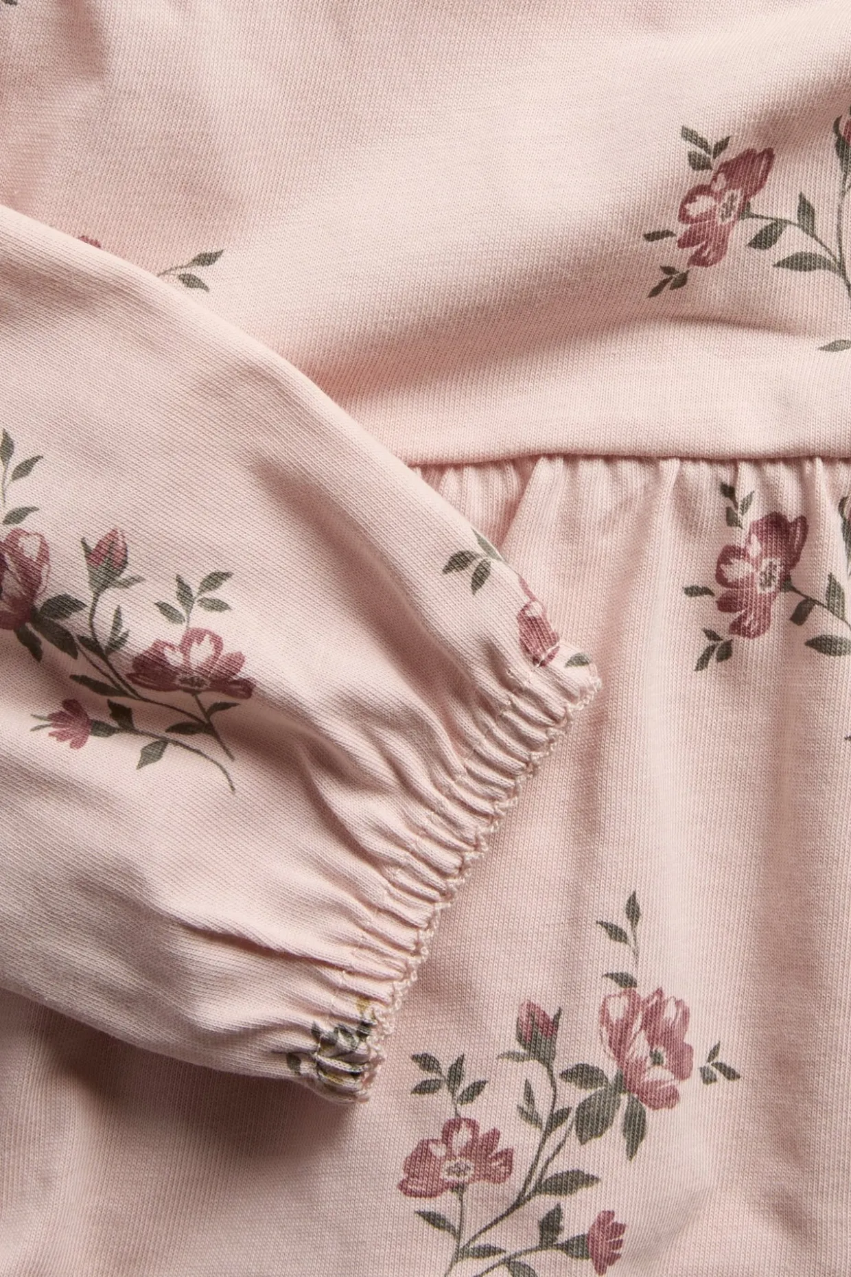 Langermet blomstret peplum-topp