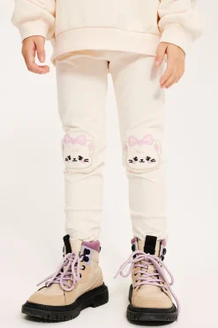 Leggings med applikasjon på knærne