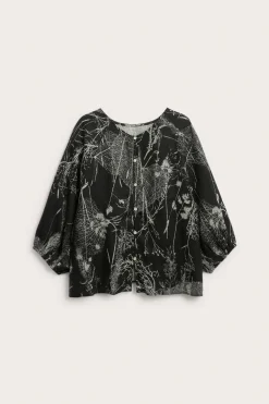 Linbluse med knappedetaljer