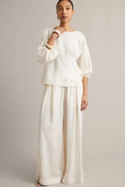 Linbluse med knappedetaljer