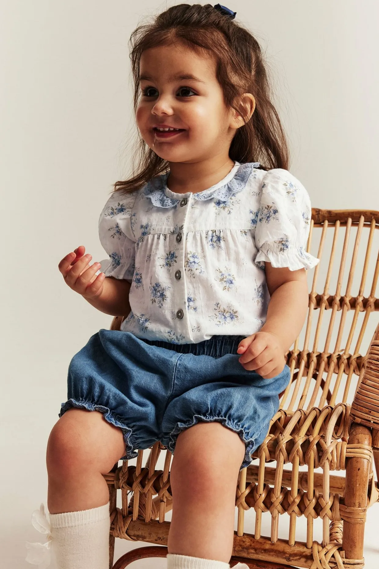 Liten blomstret kortermet body