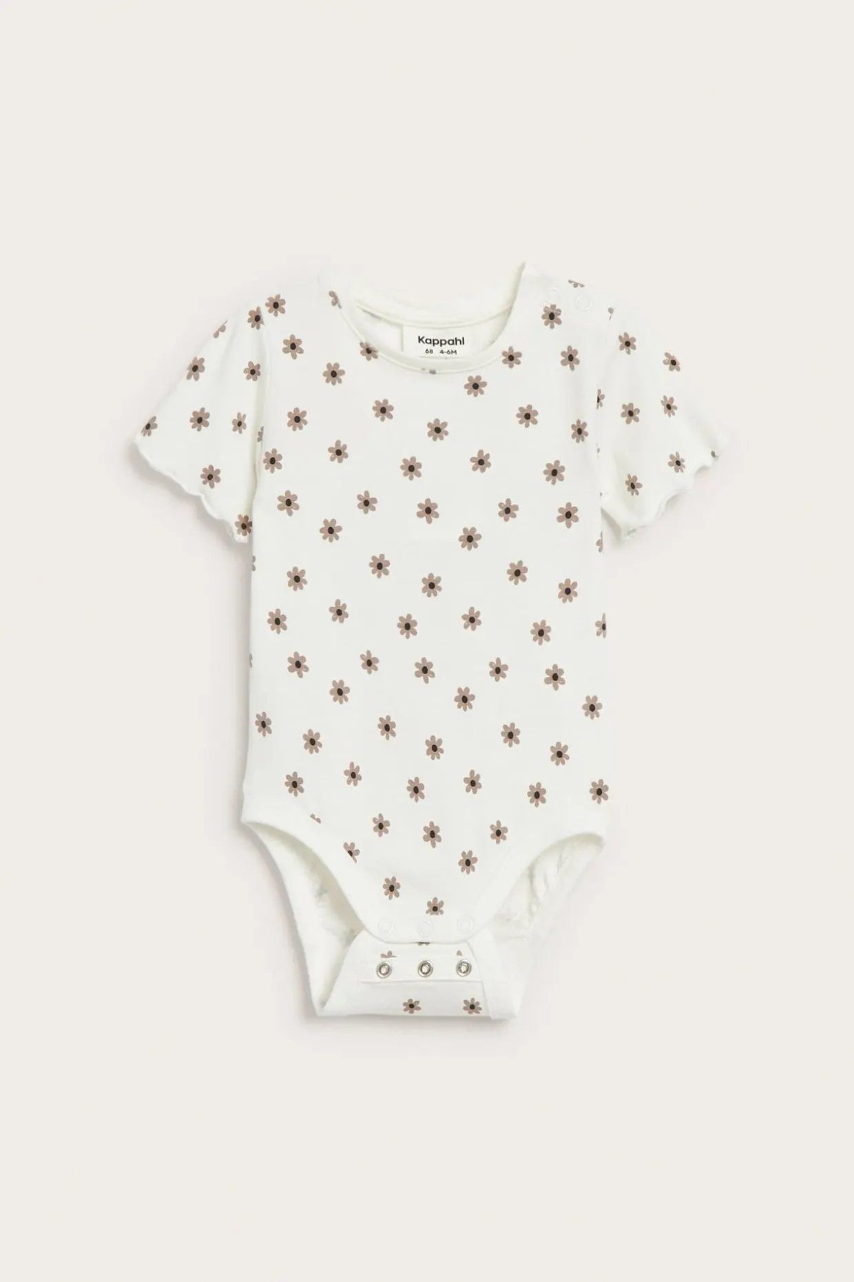 Liten blomstret kortermet body