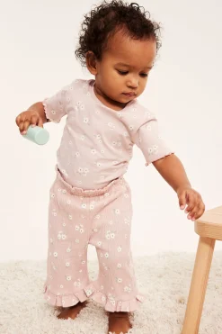 Liten blomstret kortermet body