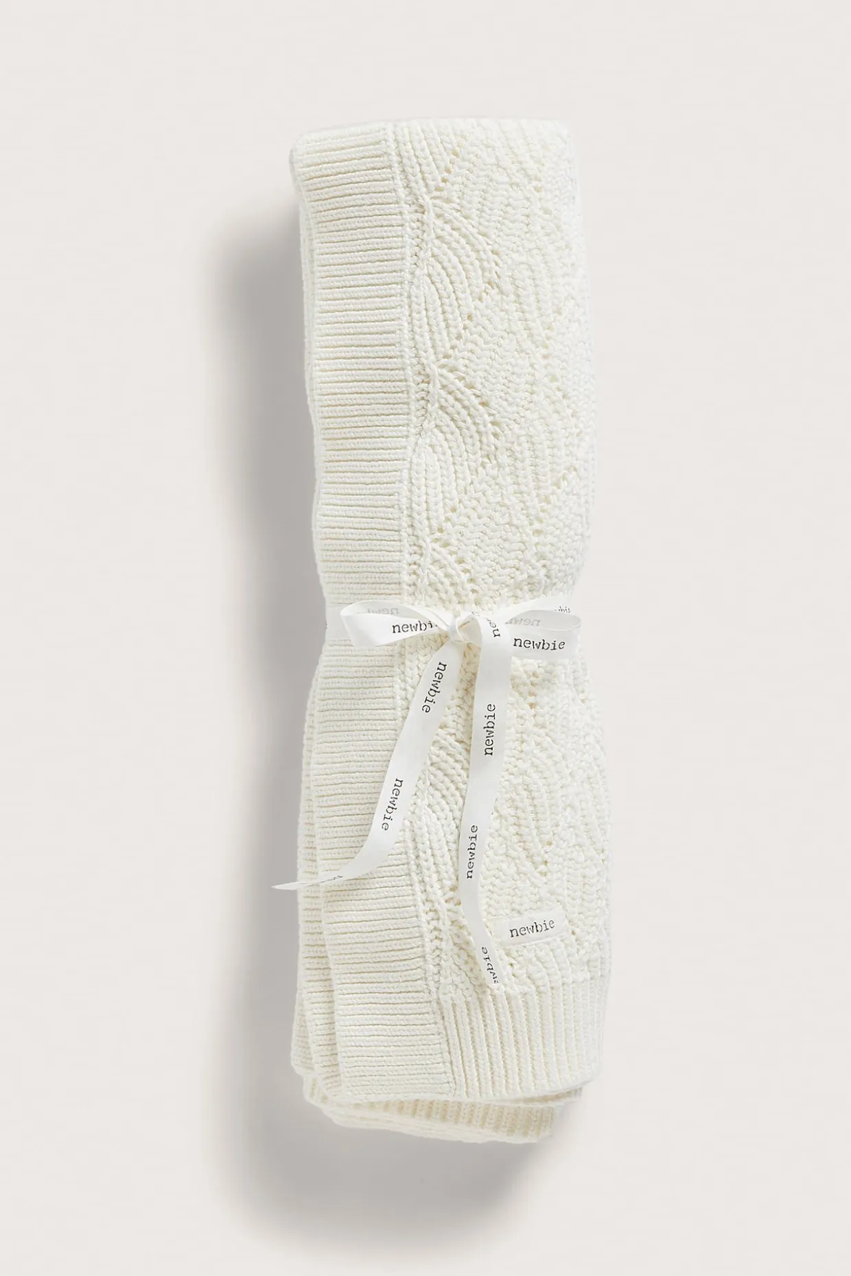 Mønsterstrikket babypledd