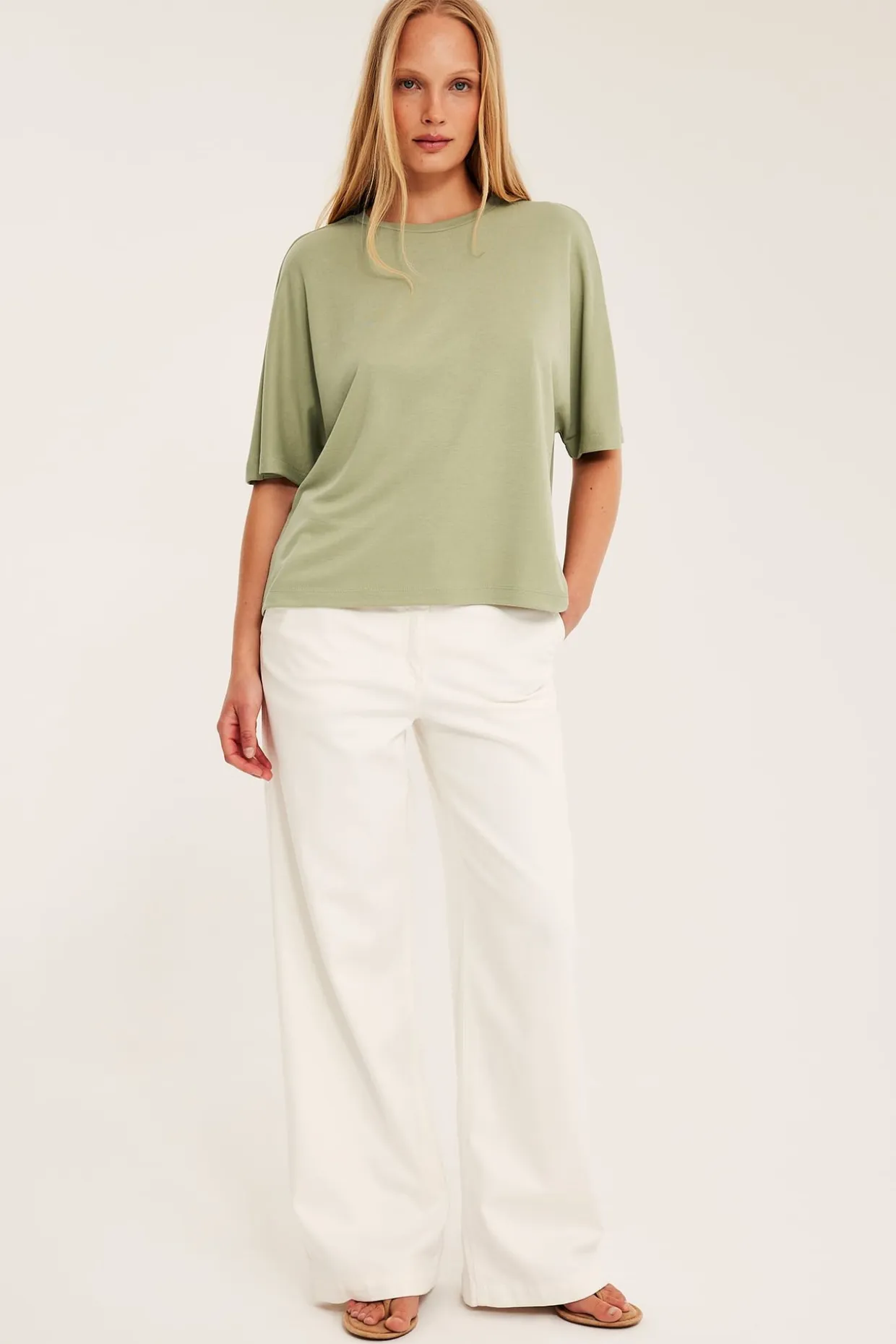 Oversized topp med korte ermer
