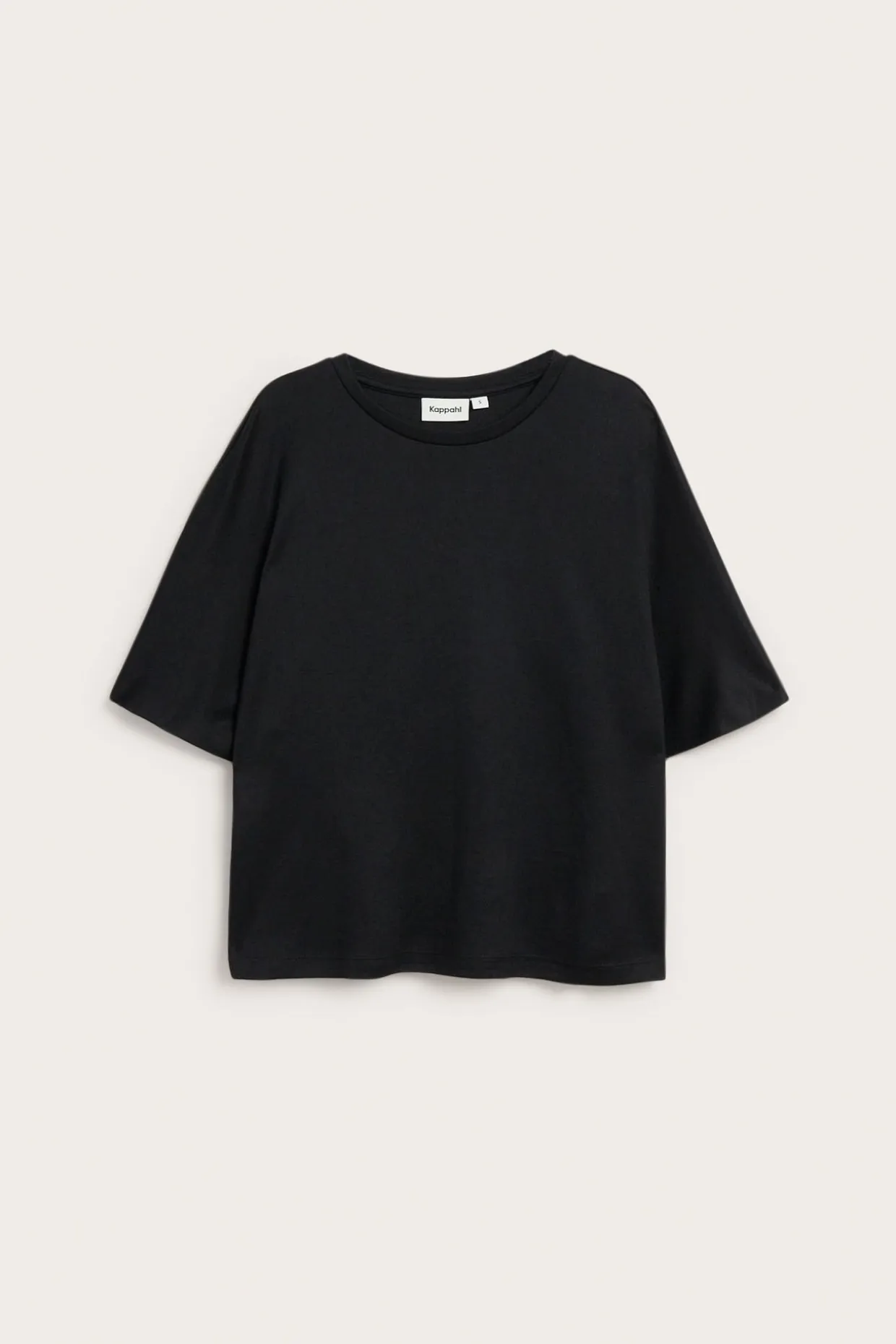 Oversized topp med korte ermer