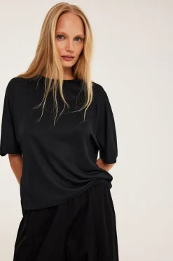 Oversized topp med korte ermer