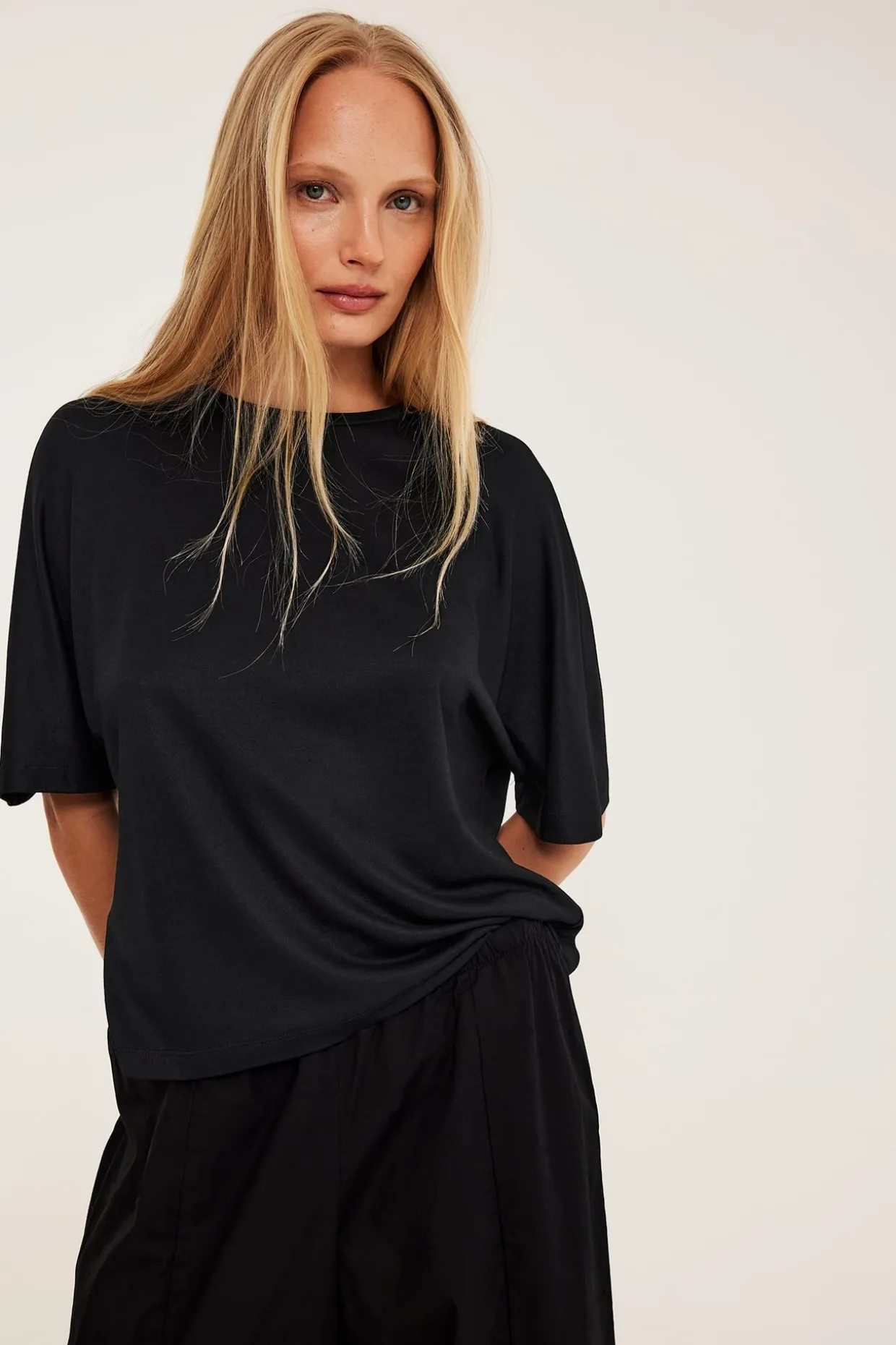 Oversized topp med korte ermer