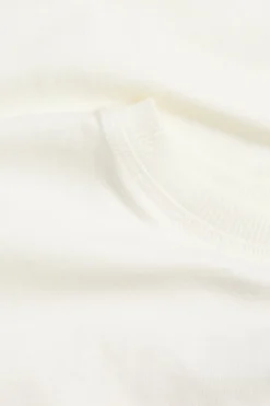Oversized T-skjorte med strandmotiv